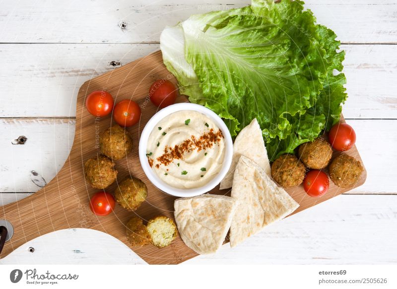 Falafel and vegetables on white wooden background Food Healthy Eating Food photograph Vegetable Grain Asian Food Bowl Fresh Brown falafel Chickpeas Tomato