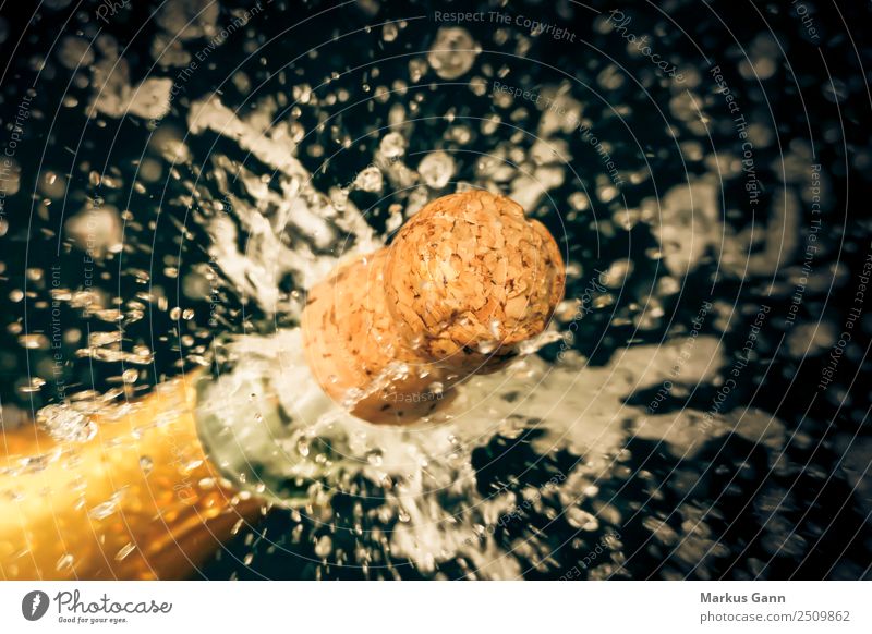 Champagne cork shoots from the champagne bottle Beverage Lifestyle Yellow Explosion Sparkling wine Cork Effervescent Inject Feasts & Celebrations Drinking