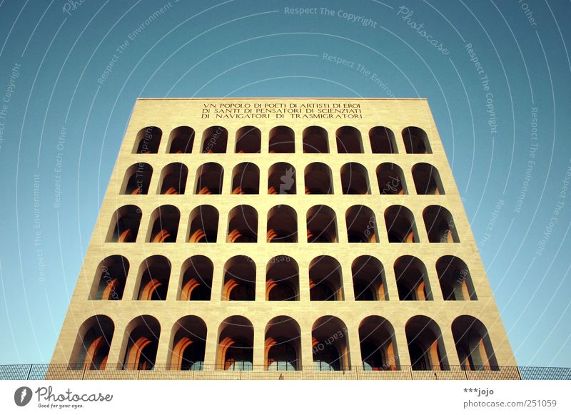 dice. Rome Modern Fascism Italy Colosseum Architecture Symmetry Monumental Landmark Column Archway Perspective Central perspective Block Concrete Neoclassicism