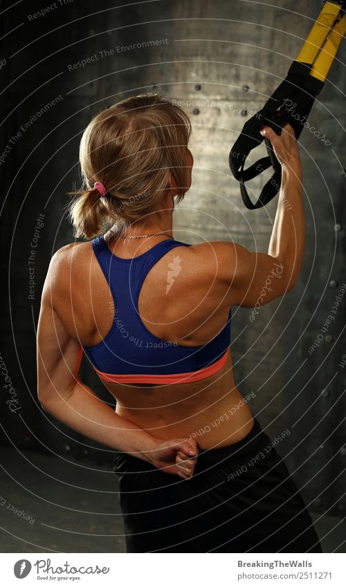 90+ Woman Doing Arm Exercises With Suspension Straps At Gym Stock Photos,  Pictures & Royalty-Free Images - iStock