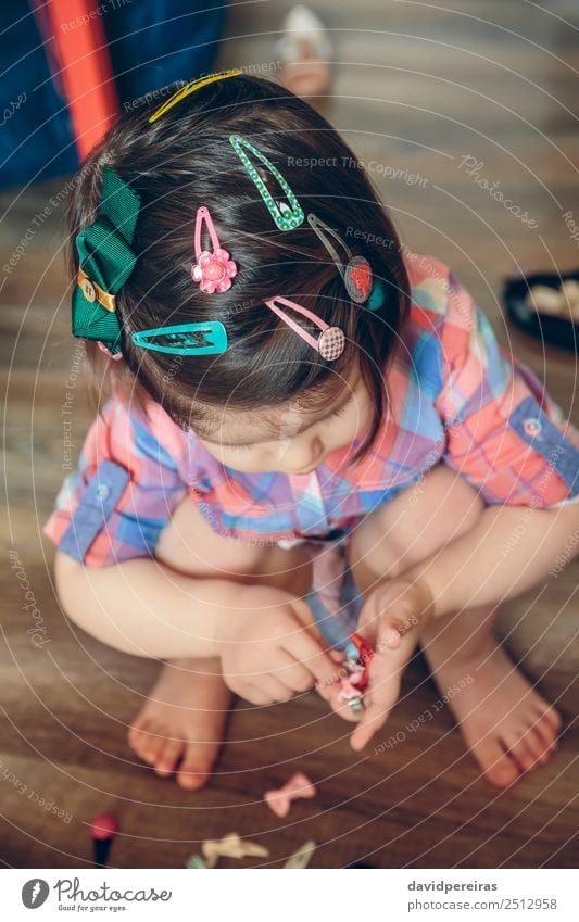 Baby girl head with a lot of hair clips Lifestyle Joy Happy Beautiful Playing House (Residential Structure) Child Human being Toddler Woman Adults Infancy Hand