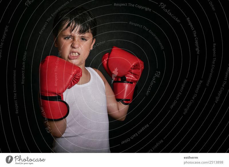 little boy with boxing gloves on black background Lifestyle Sports Martial arts Success Human being Masculine Toddler Boy (child) Infancy 1 8 - 13 years Child