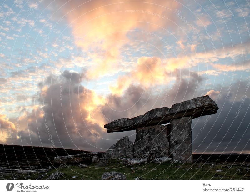 Poulnabrone Dolmen² Calm Vacation & Travel Freedom Nature Sky Clouds Rock Ireland Ruin Tomb Tourist Attraction Old Large Yellow Stone Monument Colour photo