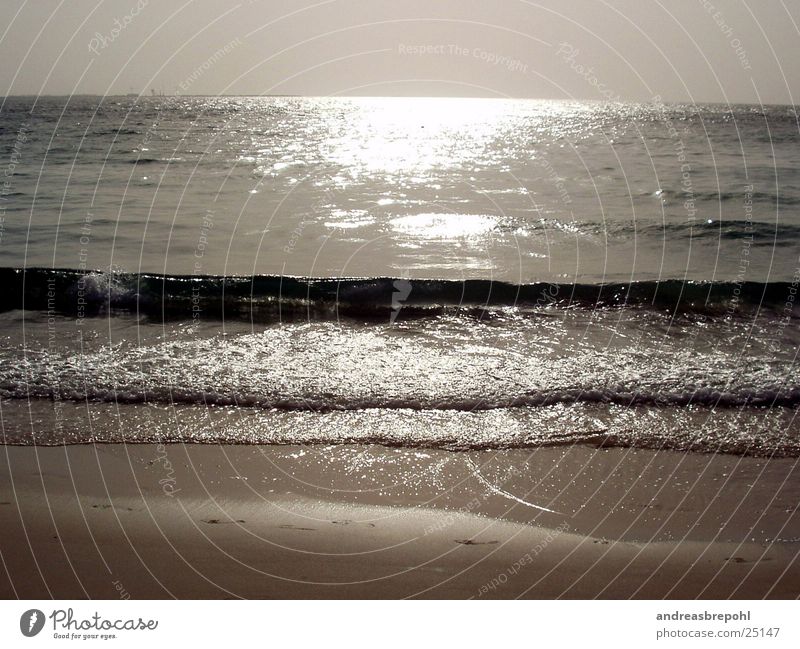 Water stop... what else? Horizon Waves Mirror To break (something) Beach Sun Reflection Sand