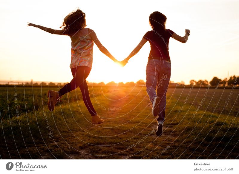 sun jump Feminine Young woman Youth (Young adults) 2 Human being Nature Cloudless sky Summer Beautiful weather Field Jump Elegant Happiness Together Moody Happy