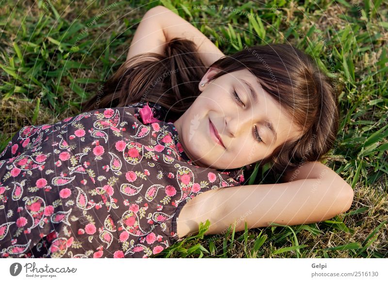 Adorable girl relaxed on the green grass Joy Happy Relaxation Vacation & Travel Summer Sun Child Human being Baby Woman Adults Infancy Youth (Young adults)