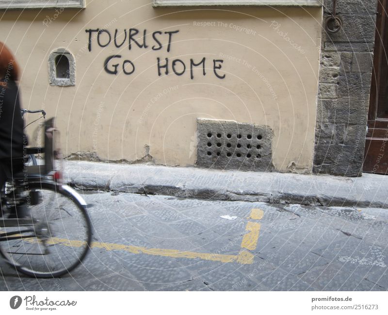 Graffiti: Tourist go home. By Alexander Hauk Life Human being Art Artist Street Bicycle Adventure Aggression Emotions Money Break taboo Luxury