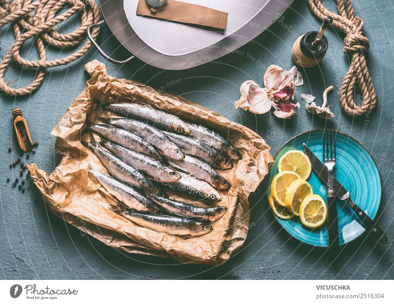Fresh sardines on the kitchen table Food Fish Herbs and spices Cooking oil Nutrition Diet Crockery Style Design Healthy Healthy Eating Table Kitchen Restaurant