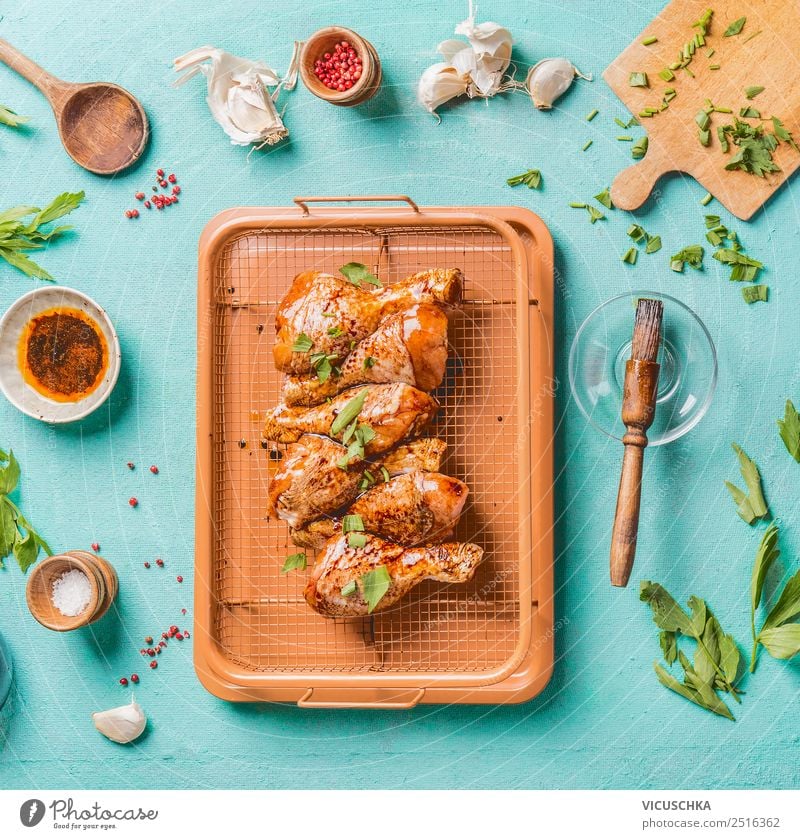 Marinated chicken legs on grill rack Food Meat Nutrition Lunch Dinner Organic produce Crockery Bowl Style Design Kitchen Barbecue (apparatus) Chicken Sauce