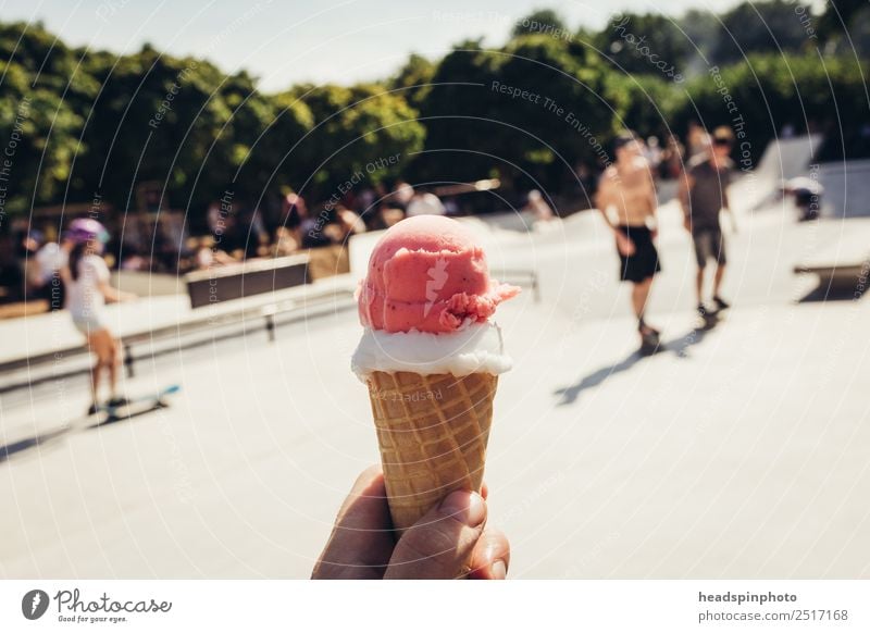 Two scoops of ice cream in the waffle in the skate park Dessert Ice cream Candy Lifestyle Leisure and hobbies Summer Sun Party Skateboard Skateboarding
