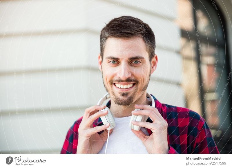 portrait of young cheerful attractive man outdoors Lifestyle Style Happy Human being Man Adults Street Fashion Smiling Cool (slang) Friendliness Happiness