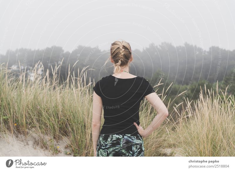 Rear view of a blonde woman looking into foggy landscape Vacation & Travel Adventure Far-off places Woman Adults 1 Human being 30 - 45 years Bad weather Blonde