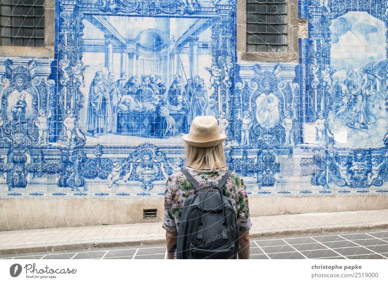 Rear view of a woman looking at azulejos in Porto Vacation & Travel Tourism Trip City trip Summer Summer vacation Young woman Youth (Young adults) 1 Human being