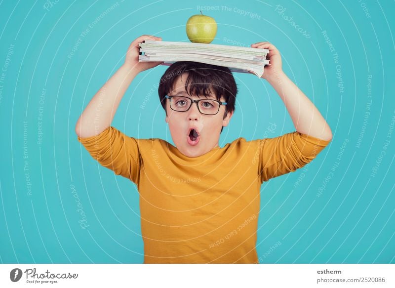 little boy with green apple and books Fruit Apple Lifestyle Joy Relaxation Reading Education Child School Schoolchild Human being Masculine Toddler Infancy 1