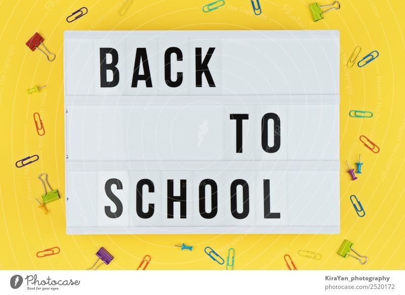 Lightbox with text BACK TO SCHOOL on yellow background Shopping Style Design Desk Table School Academic studies Workplace Office Autumn Accessory Above Yellow