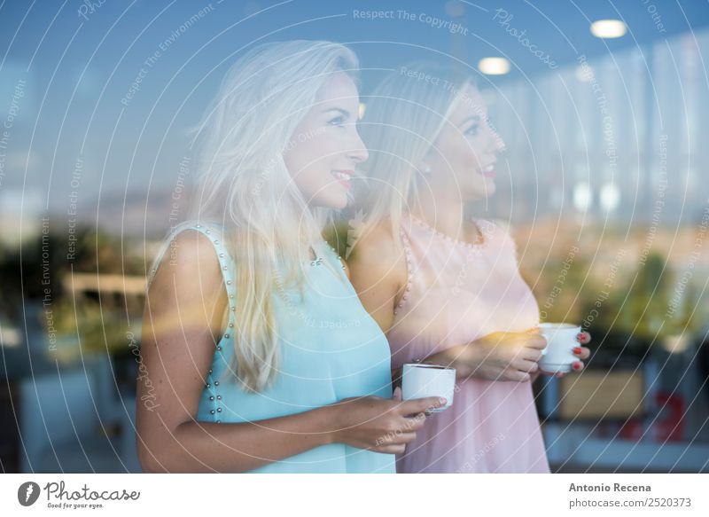Sisters behind the glass Drinking Coffee Lifestyle Happy Beautiful Mirror Restaurant Feminine Woman Adults Friendship 2 Human being 18 - 30 years