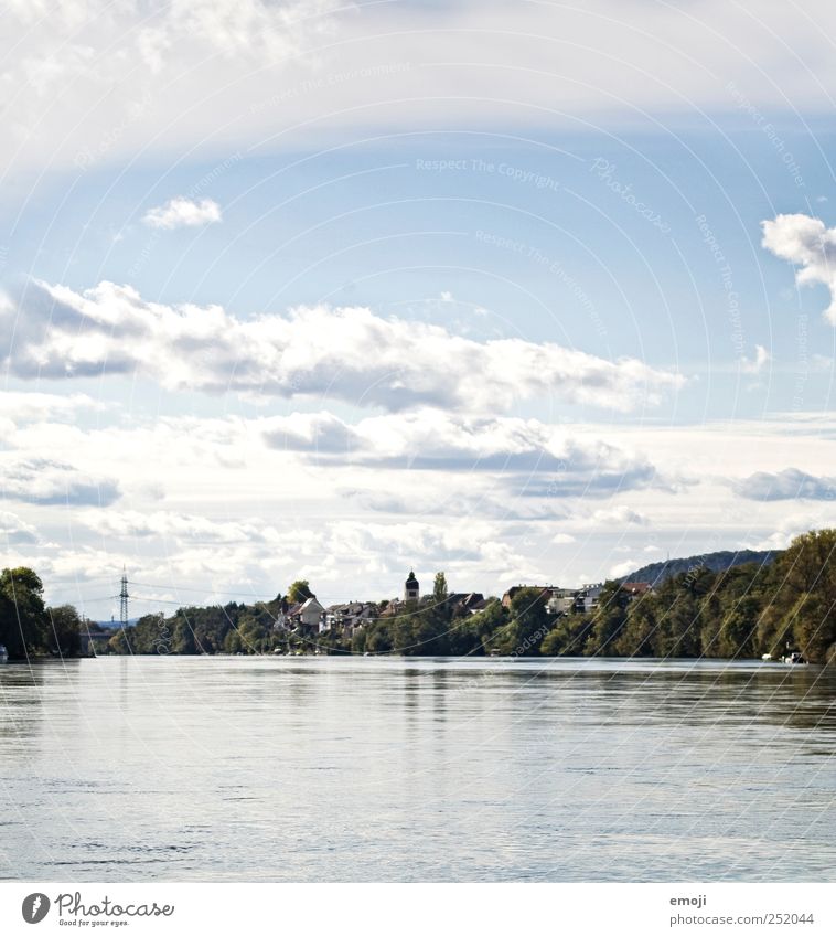 On the Rhine Water Sky Clouds Beautiful weather River Village Outskirts Blue rheinfelden Border Colour photo Exterior shot Deserted Copy Space top