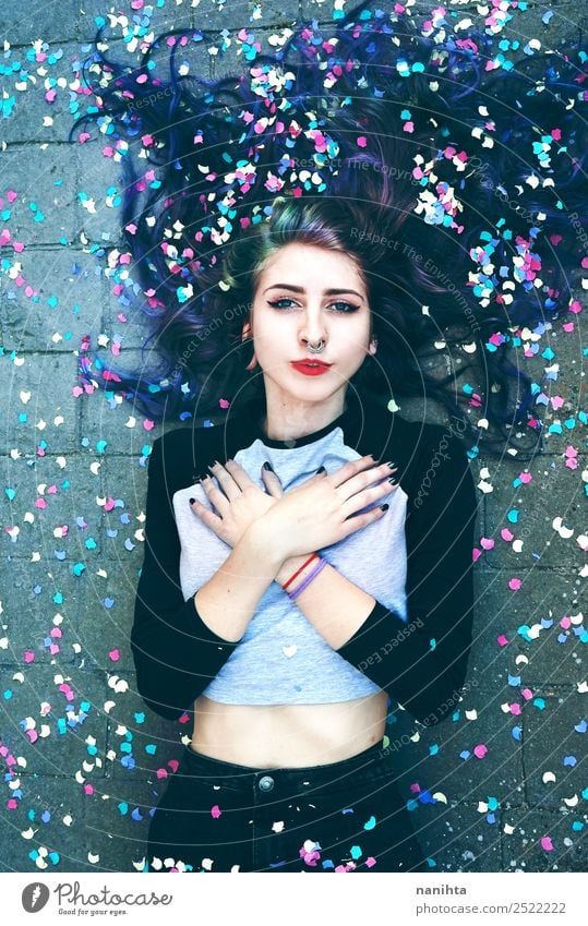 Teenage woman surrounded by confetti Style Design Beautiful Hair and hairstyles Wellness Harmonious Well-being Relaxation Calm Human being Feminine Young woman