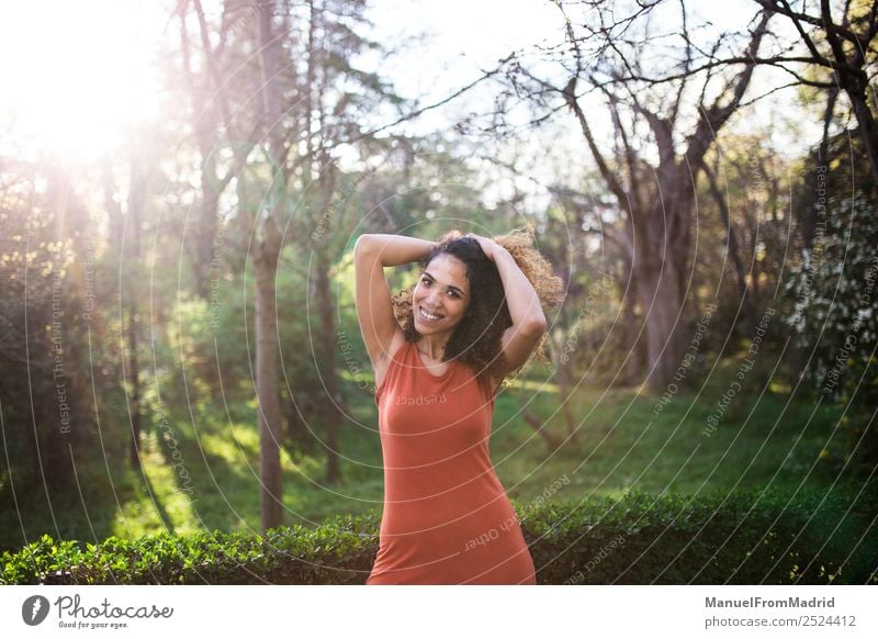 cheerful black afro woman outdoors Lifestyle Joy Happy Beautiful Face Leisure and hobbies Freedom Summer Sun Camera Human being Woman Adults Nature Tree Grass