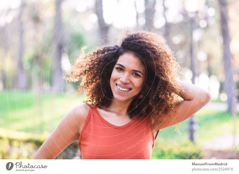 cheerful black afro woman outdoors Lifestyle Joy Happy Beautiful Face Leisure and hobbies Freedom Summer Sun Camera Human being Woman Adults Nature Tree Grass