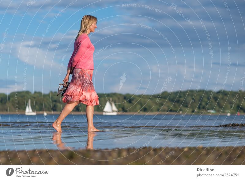 Woman walking barefoot on Kiel's Baltic beach Well-being Vacation & Travel Tourism Far-off places Freedom Summer Summer vacation Beach Ocean Human being