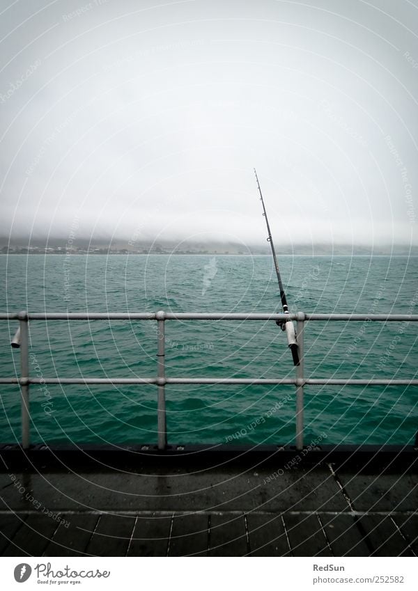Shut up and FISH! Fishing (Angle) Trip Fishing rod Water Bad weather Coast Ocean Relaxation Dark Blue Calm Fishery Handrail Wait waiting Colour photo