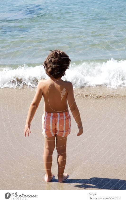 adorable boy playing in the beach over a white background Joy Happy Beautiful Swimming pool Playing Vacation & Travel Trip Summer Sun Beach Ocean Child