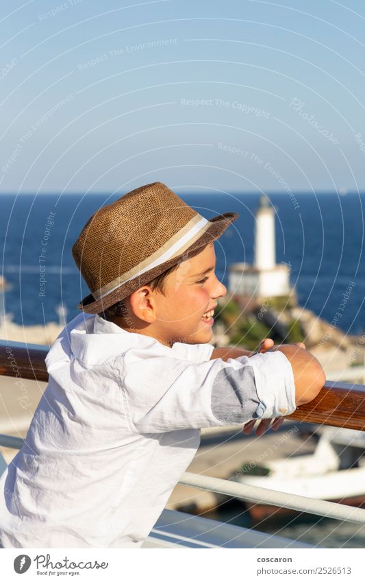 Little kid looking at sea from the railing of a cruise Lifestyle Joy Happy Beautiful Vacation & Travel Cruise Summer Sun Beach Ocean Child Human being Masculine