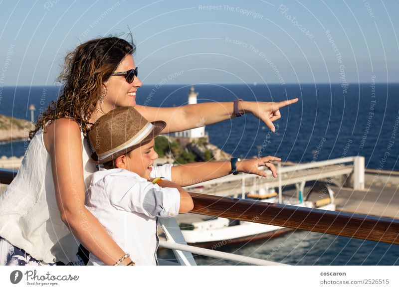 Mother and son pointing a place near the sea Lifestyle Happy Beautiful Vacation & Travel Summer Beach Ocean Child Boy (child) Woman Adults Family & Relations