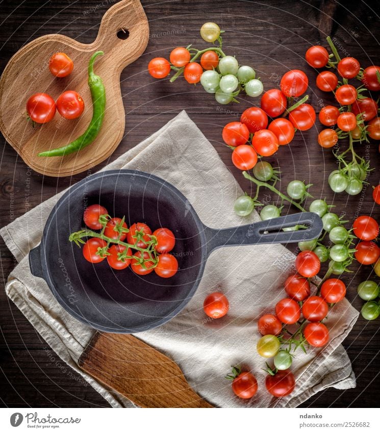 frying pan and ripe red cherry tomatoes Vegetable Vegetarian diet Pan Kitchen Wood Eating Fresh Small Natural Above Green Red Black Cherry Tomato food healthy