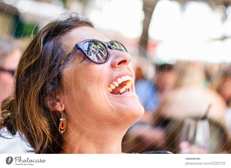 Portrait of a middle aged woman laughing Lifestyle Joy Happy Beautiful Face Summer Winter Human being Feminine Woman Adults 1 30 - 45 years Nature Park