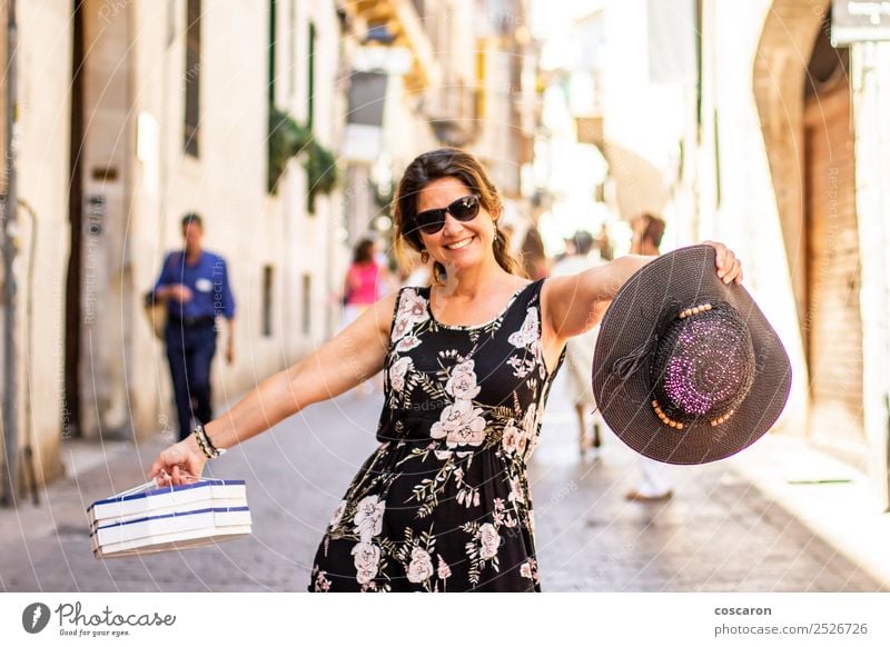 Woman shopping on the streets of Palma, Majorca, Spain. Lifestyle Shopping Joy Happy Beautiful Relaxation Vacation & Travel Tourism Human being Feminine Adults