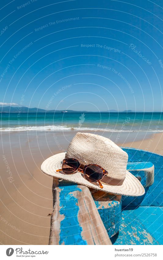 Hat on the beach Relaxation Vacation & Travel Tourism Beach Ocean Sports Nature Landscape Sand Coast Hut Watercraft Sunglasses Scarf Slippers Cool (slang)