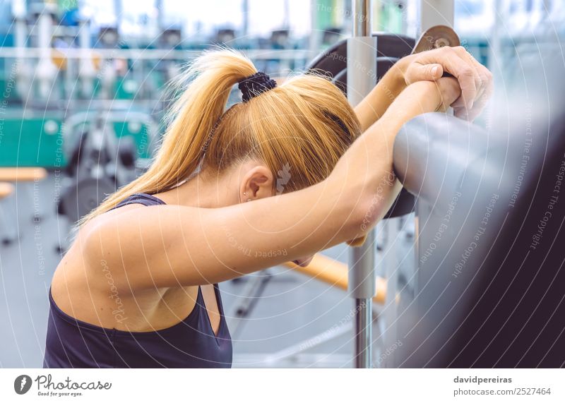 Woman resting tired after lifting barbell on muscular training Lifestyle Beautiful Body Sports Human being Adults Arm Fitness Authentic Thin Eroticism Muscular