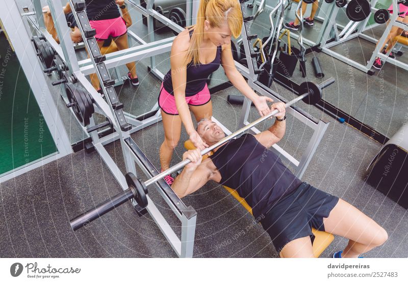 Female Personal Trainer Teaching To Woman In A Hard Suspension Training  With Fitness Straps On A Fitness Center Stock Photo, Picture and Royalty  Free Image. Image 40922665.