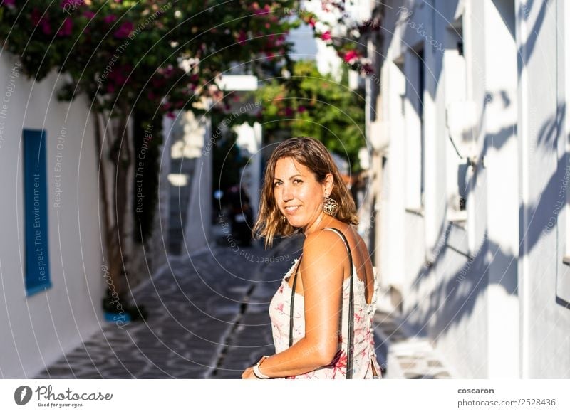 Middle aged woman on the streets of a greek village Lifestyle Happy Beautiful Vacation & Travel Tourism Summer Summer vacation Island