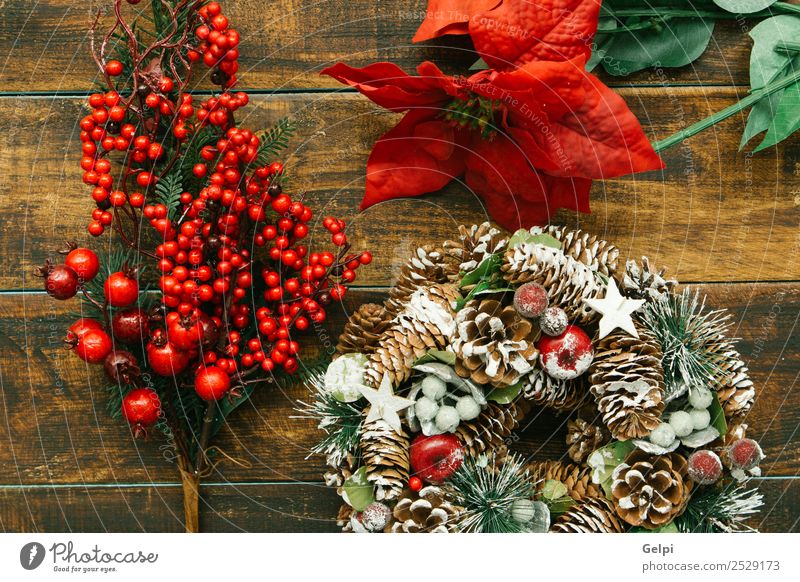 Delicate Christmas wreath of pine cones on wooden background Fruit Apple Luxury Design Winter Snow Decoration Feasts & Celebrations Christmas & Advent Autumn