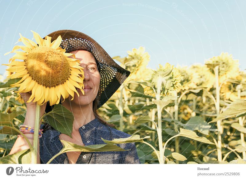 woman among the sunflowers Lifestyle Happy Tourism Adventure Human being Feminine Woman Adults Female senior 1 45 - 60 years Nature Landscape Plant Clouds