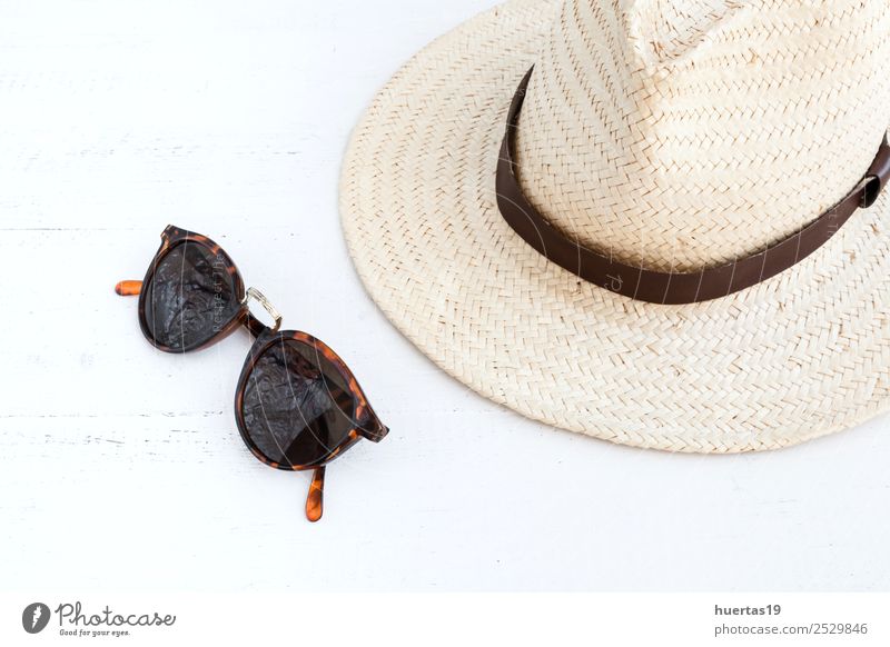 Sunglasses and hat Lifestyle Shopping Elegant Style Design Relaxation Vacation & Travel Tourism Hat Adventure holidays passport documents Things Straw hat