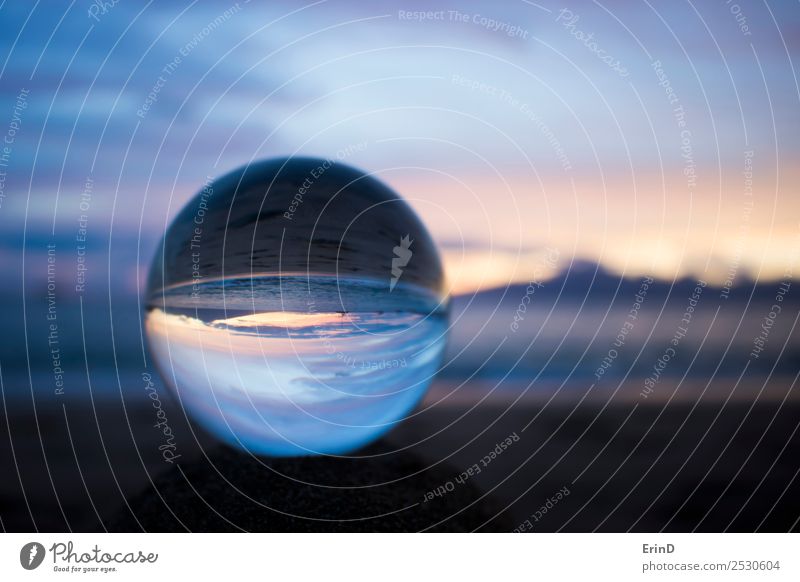 Sunset at Beach Through Glass Ball Design Beautiful Calm Ocean Waves Environment Nature Landscape Sand Sky Clouds Sphere Serene Peace Sustainability