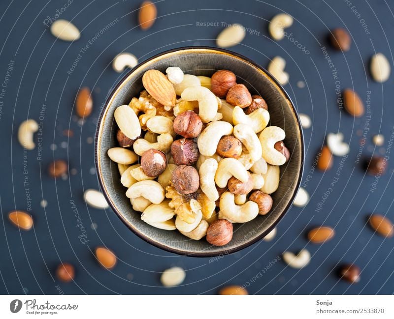 Nuts, walnuts, hazelnuts, food, Food Walnut Hazelnut Almond Nutrition Diet Snack Bowl Lifestyle Firm Healthy Mixed nuts and raisins Colour photo Interior shot