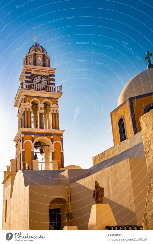 Amazing catholic cathedral in Thira, Santorini, Greece. Vacation & Travel Tourism Summer Island Clock Sky Village Town Church Dome Building Architecture