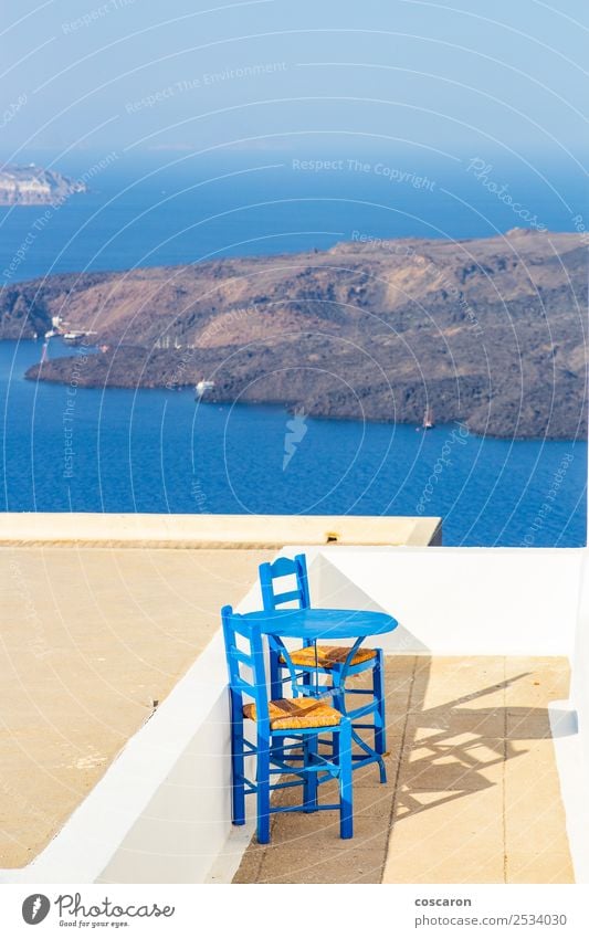 Little terrace with sea views in Santorini, Greece. Seafood Lunch Dinner Plate Design Beautiful Vacation & Travel Summer Ocean Island Chair Table Restaurant