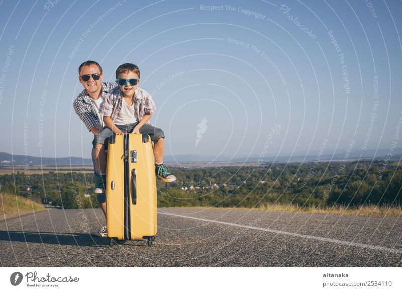 Father and son standing on the road at the day time. Lifestyle Joy Happy Playing Vacation & Travel Tourism Trip Adventure Freedom Camping Summer Hiking Sports