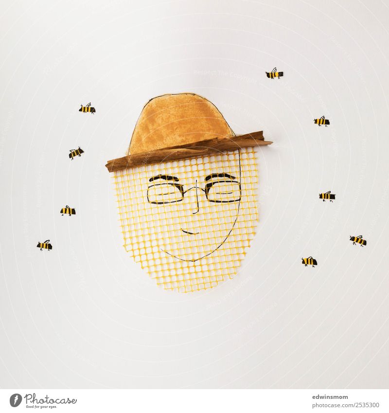 honeybee Leisure and hobbies Masculine Young man Youth (Young adults) 1 Human being Protective clothing Eyeglasses Hat Wild animal Bee Group of animals Paper