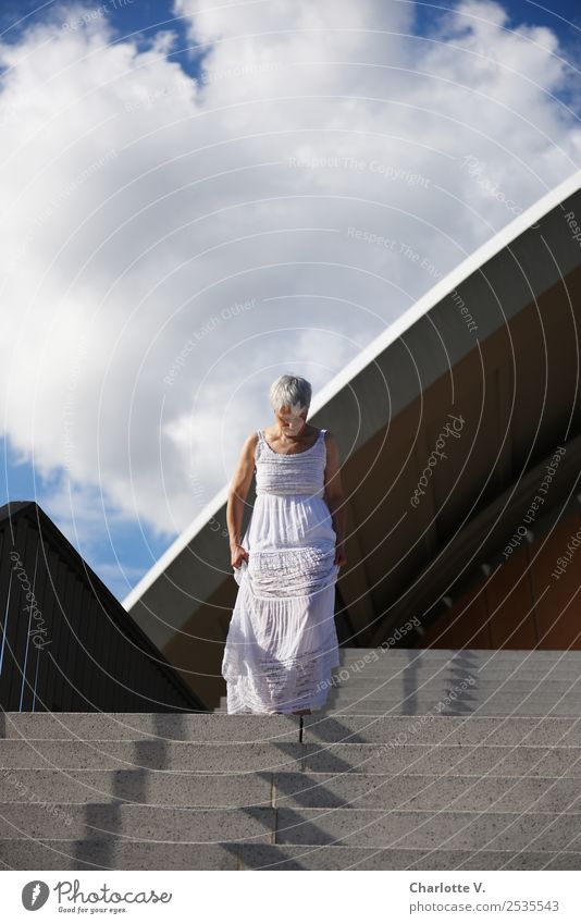 stride Human being Feminine Woman Adults Female senior 1 45 - 60 years Architecture Summer Manmade structures Stairs Facade Dress Gray-haired Short-haired