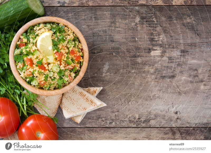 Tabbouleh salad Food Vegetable Nutrition Vegetarian diet Diet Bowl Healthy Healthy Eating Table Wood Red White Tradition Salad couscous Tomato Cucumber Parsley
