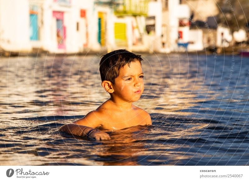 Little kid playing and swimming on the sea Lifestyle Joy Happy Beautiful Leisure and hobbies Playing Vacation & Travel Summer Beach Ocean Swimming & Bathing