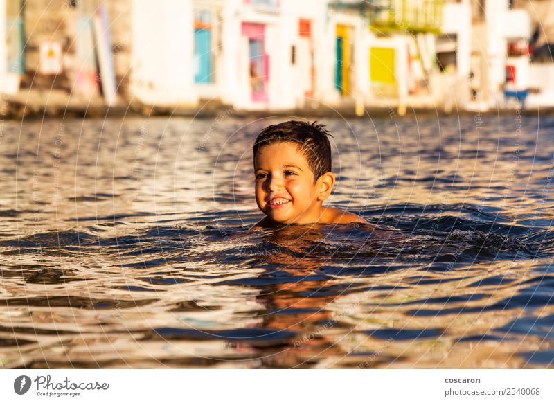 Little kid playing and swimming on the sea Lifestyle Joy Happy Beautiful Leisure and hobbies Playing Vacation & Travel Summer Beach Ocean Swimming & Bathing