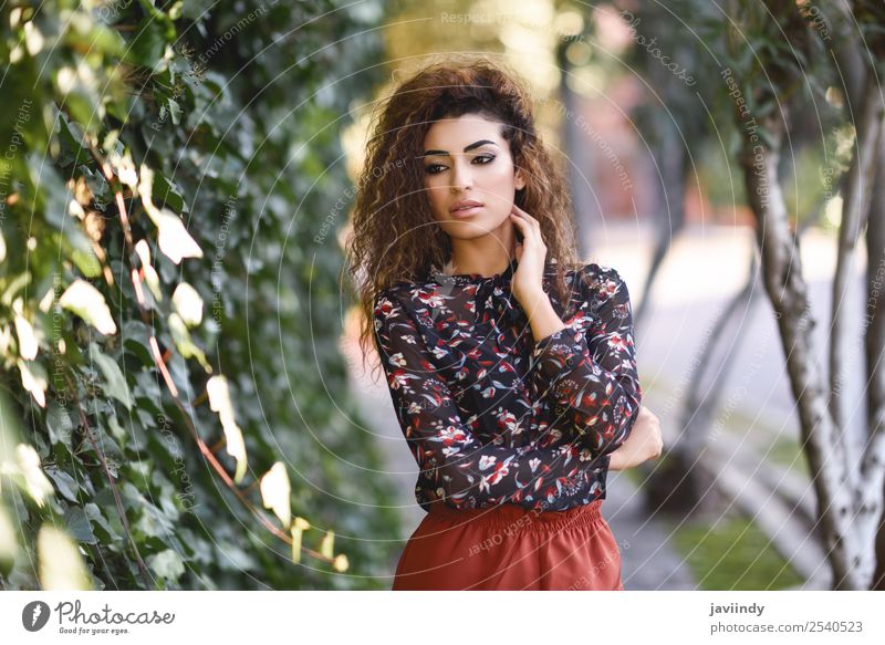 Beautiful young Arab woman with black curly hairstyle Lifestyle Style Hair and hairstyles Human being Feminine Young woman Youth (Young adults) Woman Adults 1